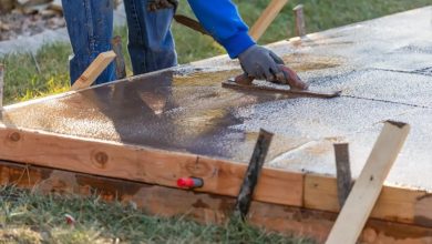 6661c458aaab92f981748da8 worker smoothing wet concrete